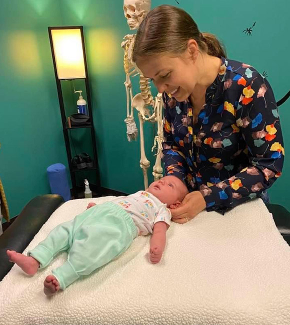 chiropractor with baby